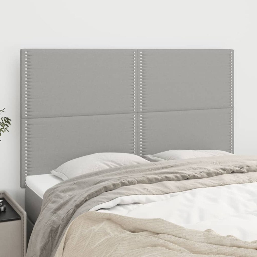 vidaXL Sänggavel ljusgrå 144x5x118/128 cm tyg