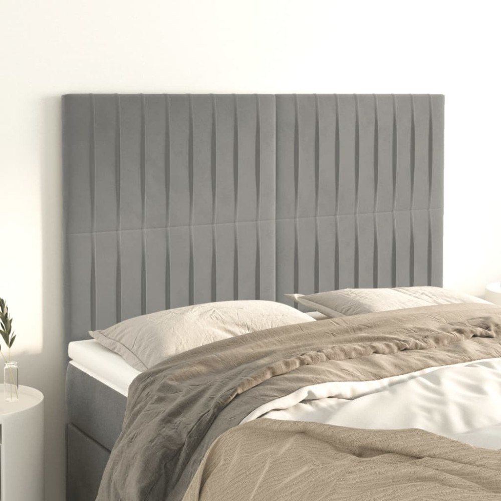 vidaXL Sänggavel ljusgrå 144x5x118/128 cm sammet