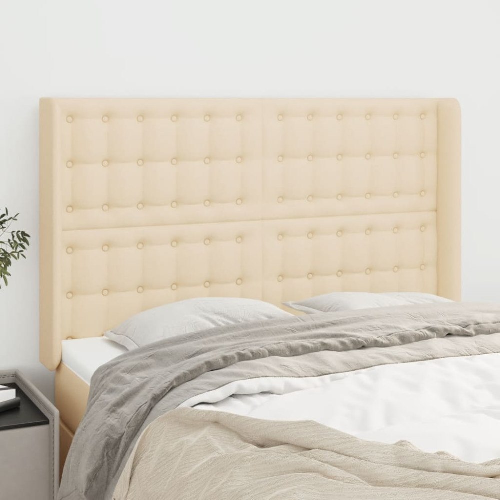 vidaXL Sänggavel med kanter gräddvit 147x16x118/128 cm tyg