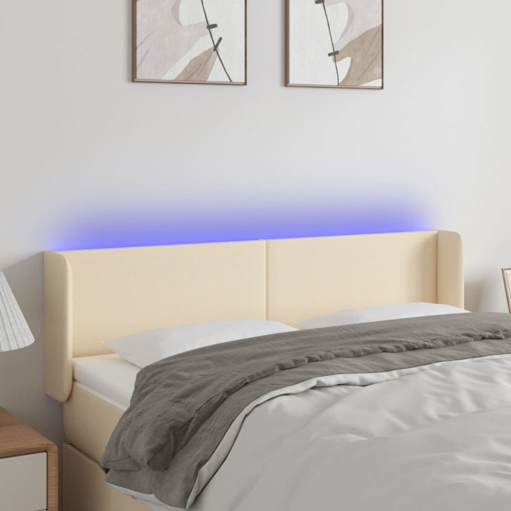 vidaXL Sänggavel LED gräddvit 147x16x78/88 cm tyg