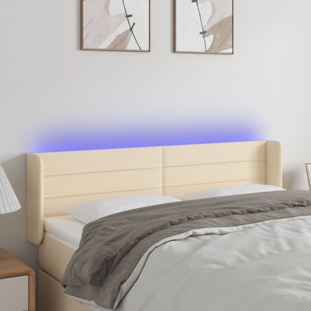 vidaXL Sänggavel LED gräddvit 147x16x78/88 cm tyg