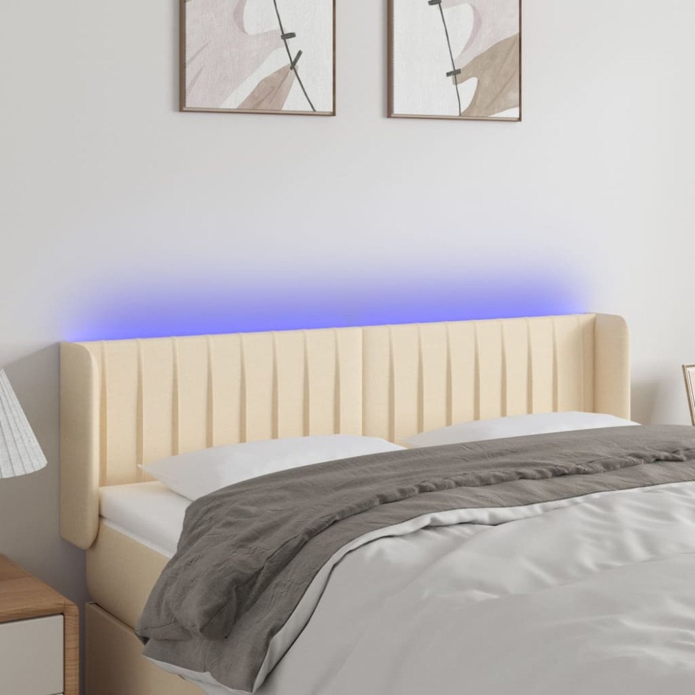 vidaXL Sänggavel LED gräddvit 147x16x78/88 cm tyg