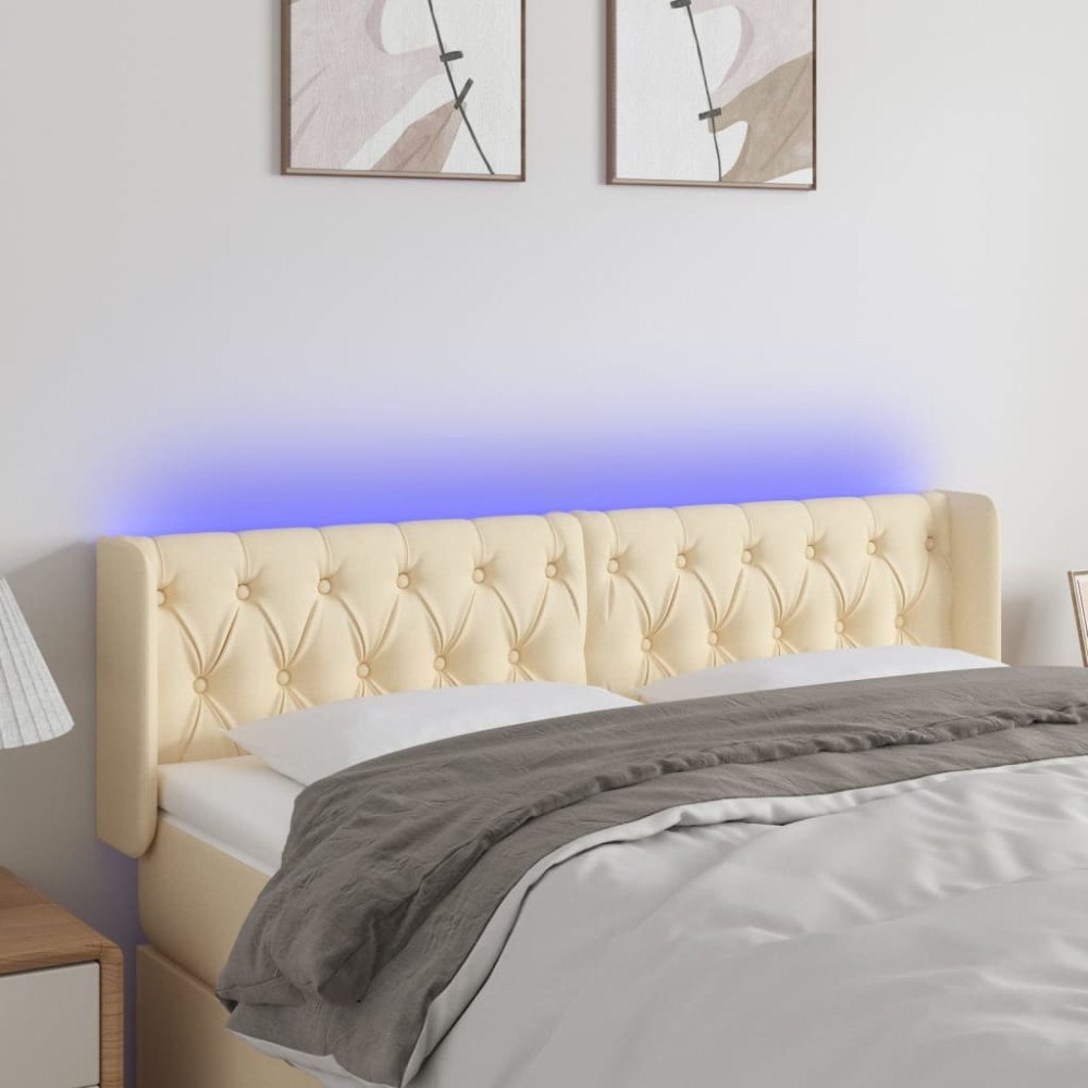 vidaXL Sänggavel LED gräddvit 147x16x78/88 cm tyg