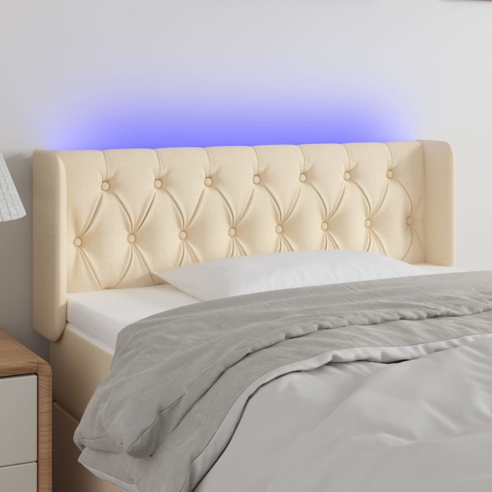 vidaXL Sänggavel LED gräddvit 103x16x78/88 cm tyg
