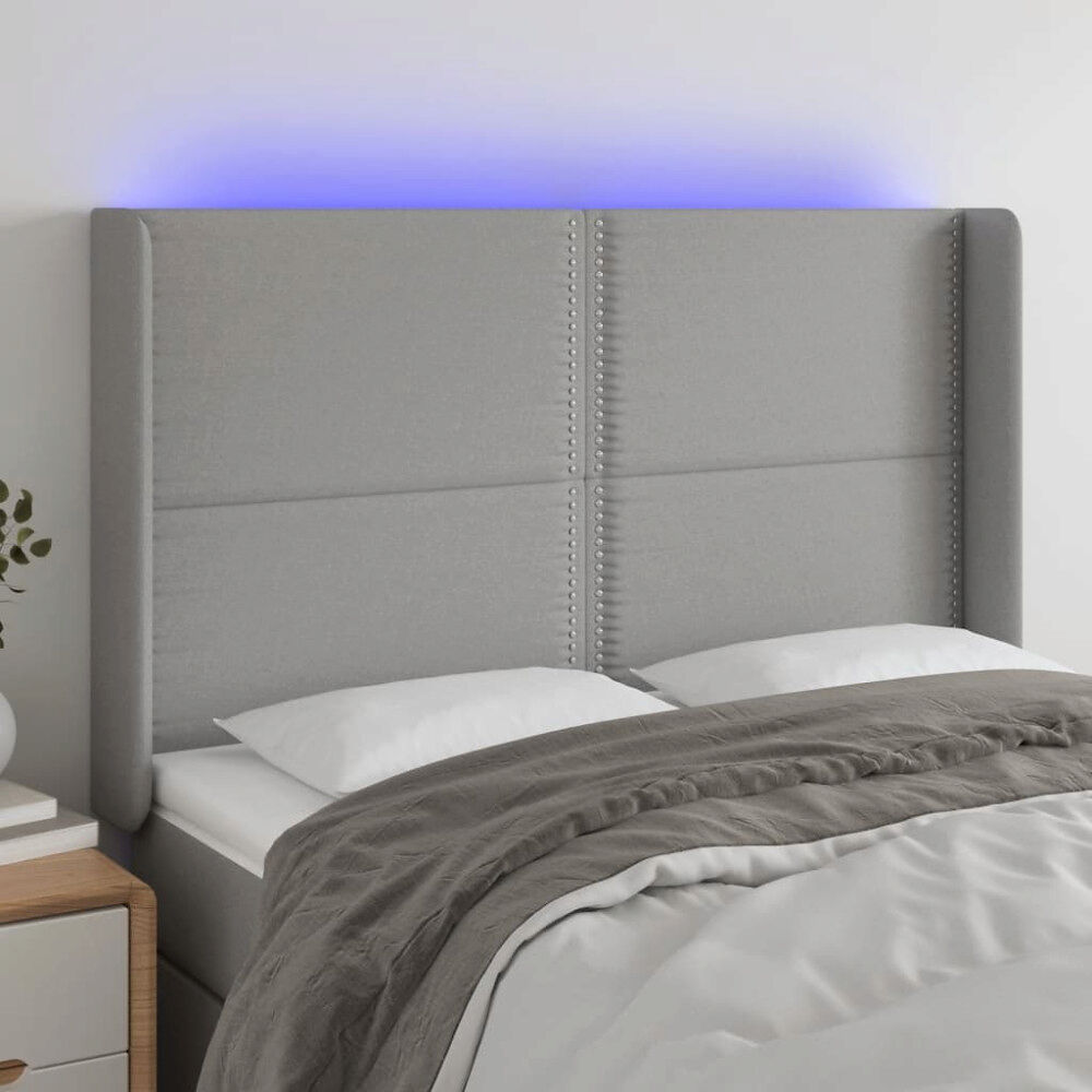 vidaXL Sänggavel LED ljusgrå 147x16x118/128 cm tyg