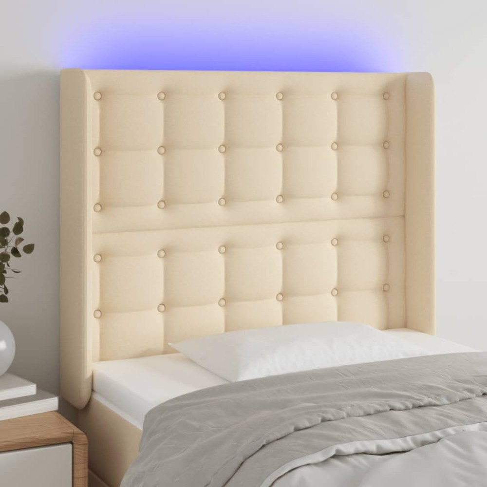 vidaXL Sänggavel LED gräddvit 83x16x118/128 cm tyg