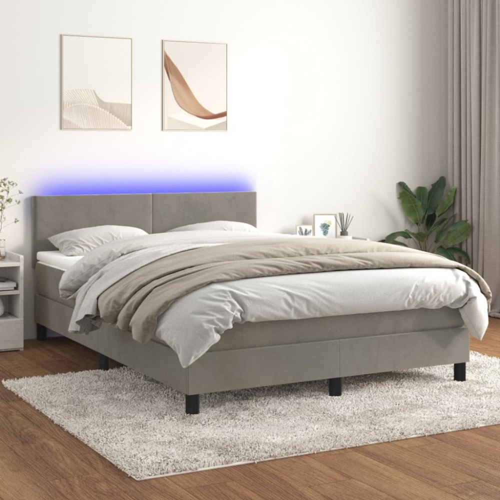 vidaXL Resårsäng med madrass och LED ljusgrå 140x190 cm sammet