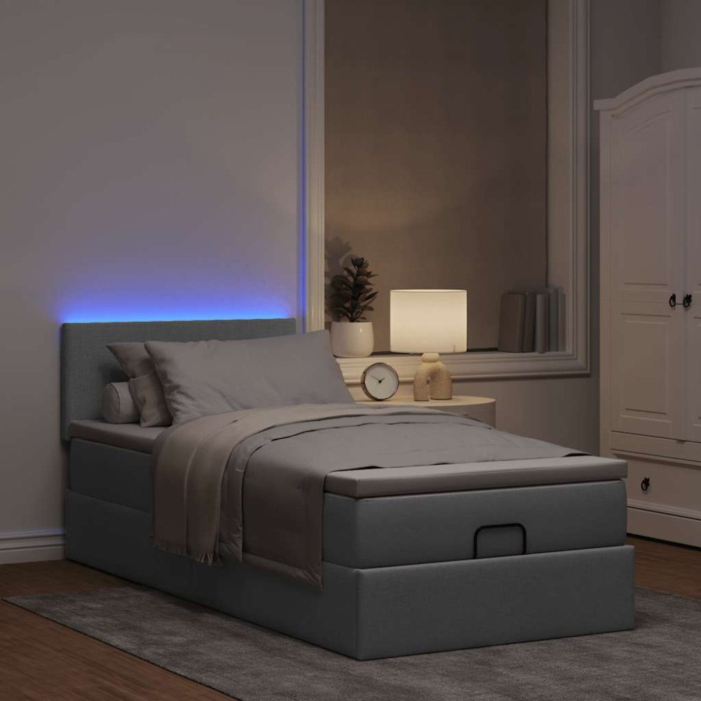vidaXL Ottomansk säng med madrass och LED-lampor ljusgrå 90x200 cm tyg