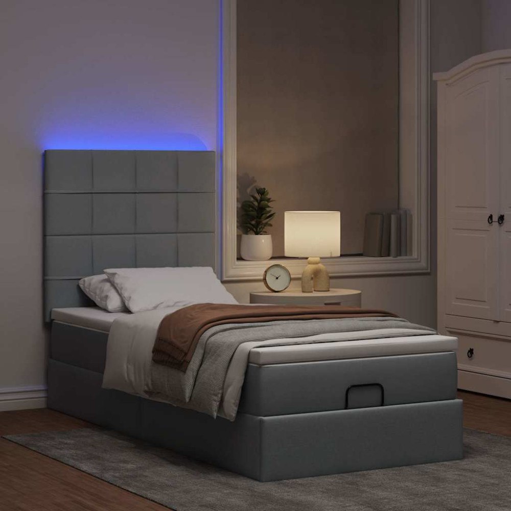 vidaXL Ottomansk säng med madrass och LED-lampor ljusgrå 90x200 cm tyg