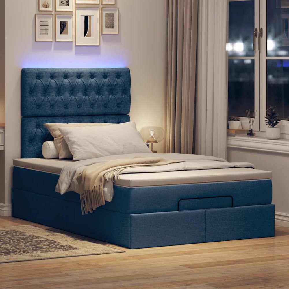vidaXL Ottoman sängram med madrass blå 120x200 cm tyg