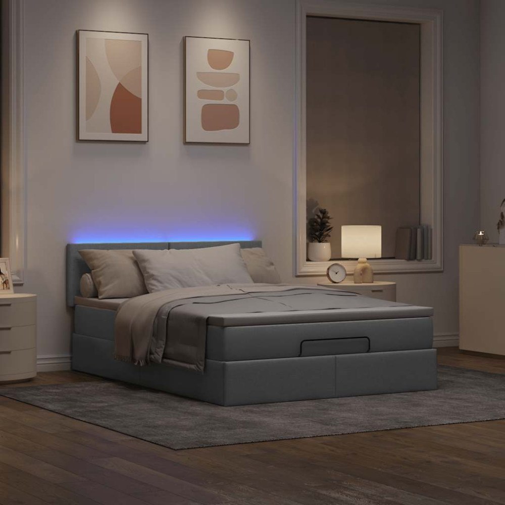 vidaXL Ottoman säng med madrass och LED-lampor ljusgrå 140x190 cm tyg