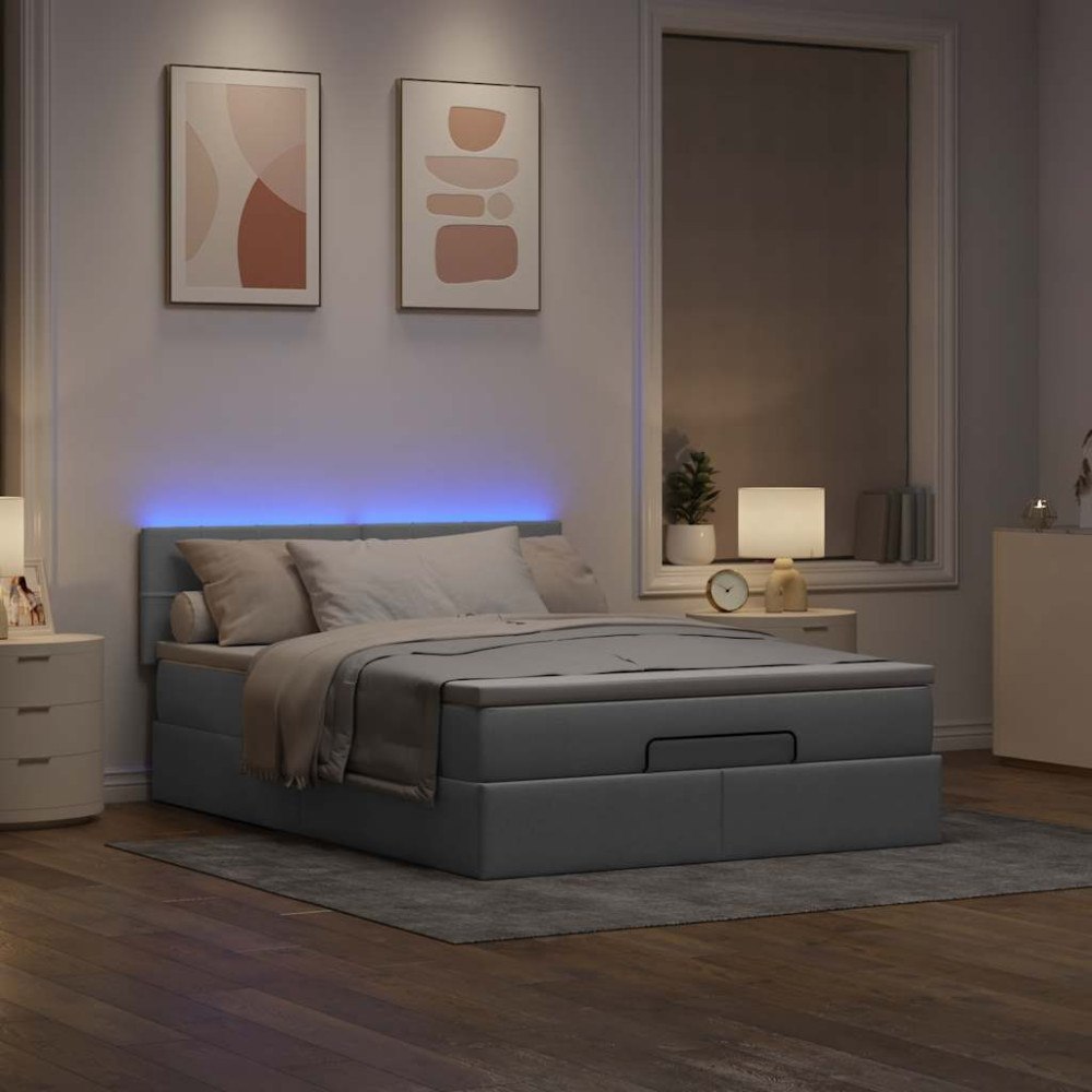 vidaXL Ottoman säng med madrass och LED-lampor ljusgrå 140x190 cm tyg