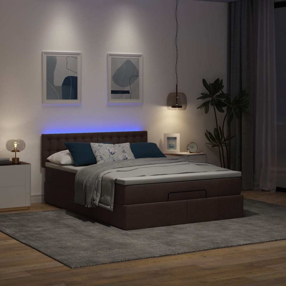 vidaXL Ottoman säng med madrass och LED-lampor mörkbrun 140x190 cm tyg