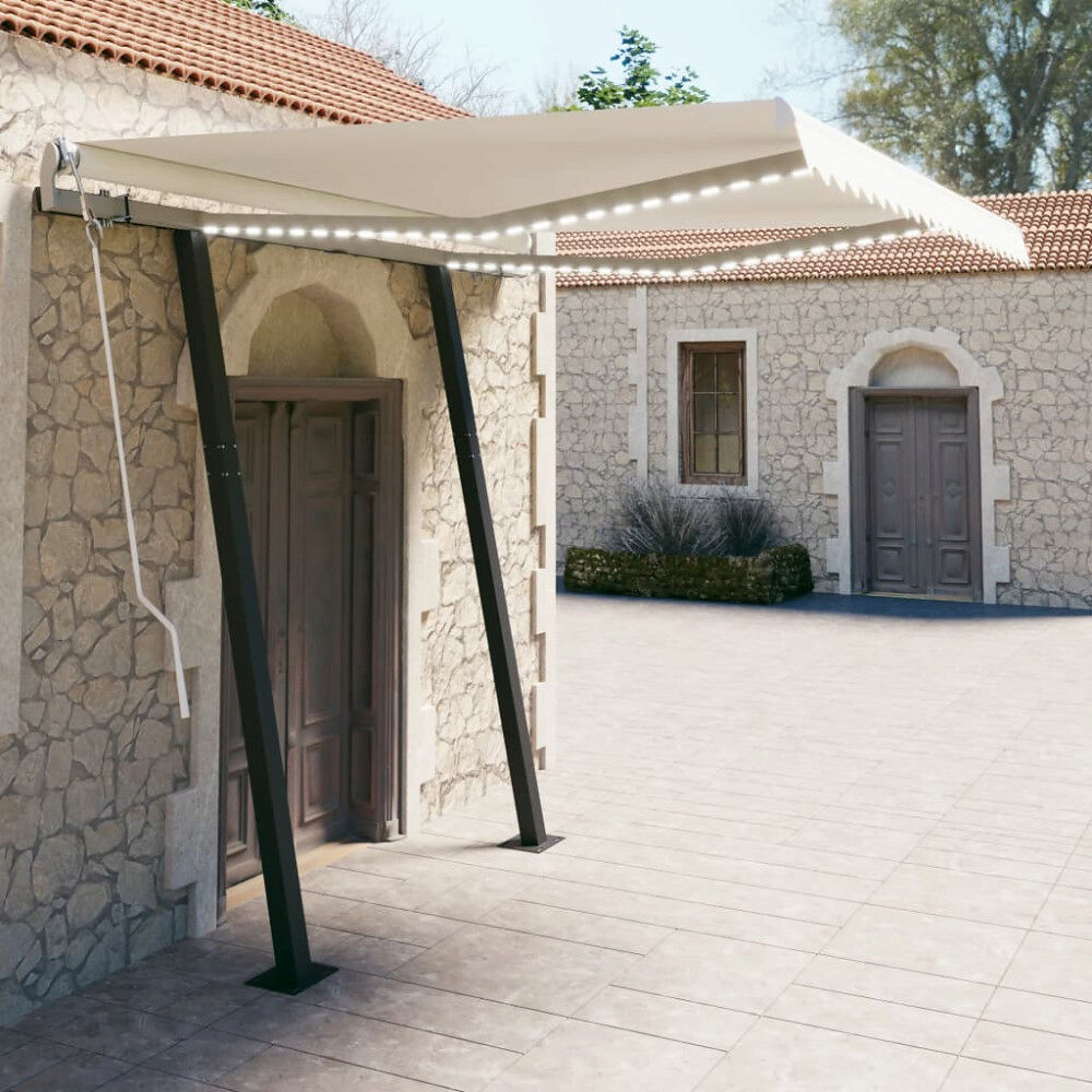 vidaXL Markis manuellt infällbar med LED 3x2,5 m gräddvit