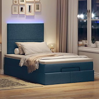 vidaXL Ottoman sängram med madrass blå 120x200 cm tyg